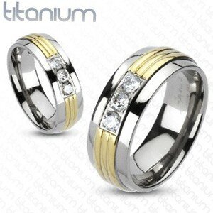 Titánium gyűrű - arany színű középső sáv, áttetsző cirkóniák - Nagyság: 55